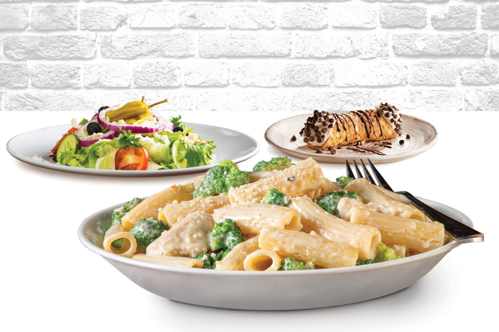 Bertucci's fall dinner with a large bowl of Rigatoni, Broccoli & Chicken, a side of Insalata, and a Traditional Cannoli for desert